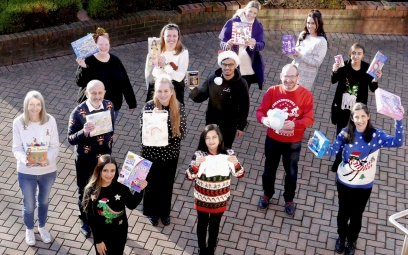 Festive Christmas jumpers ready to deliver our gifts for Cash For Kids Mission Christmas