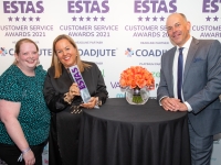 Leasa Foster and Samantha Robertson-Strong of Winston Solicitors collect their ESTAS award from Phil Spencer